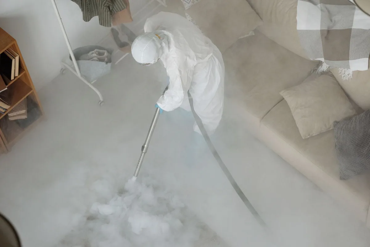 Biohazard cleanup technician in protective equipment, Gaylord, MI